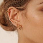 14K Solid Gold Bella Twist Huggie Hoops | S-kin Studio Jewelry | Ethical Piercing Earrings
