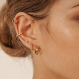 14K Solid Gold Bella Twist Huggie Hoops | S-kin Studio Jewelry | Ethical Piercing Earrings