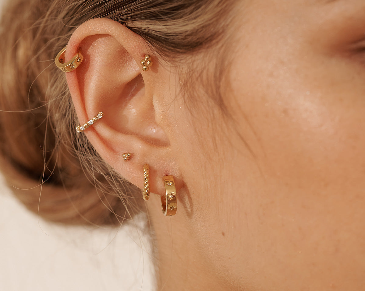 14K Solid Gold Bella Twist Huggie Hoops | S-kin Studio Jewelry | Ethical Piercing Earrings