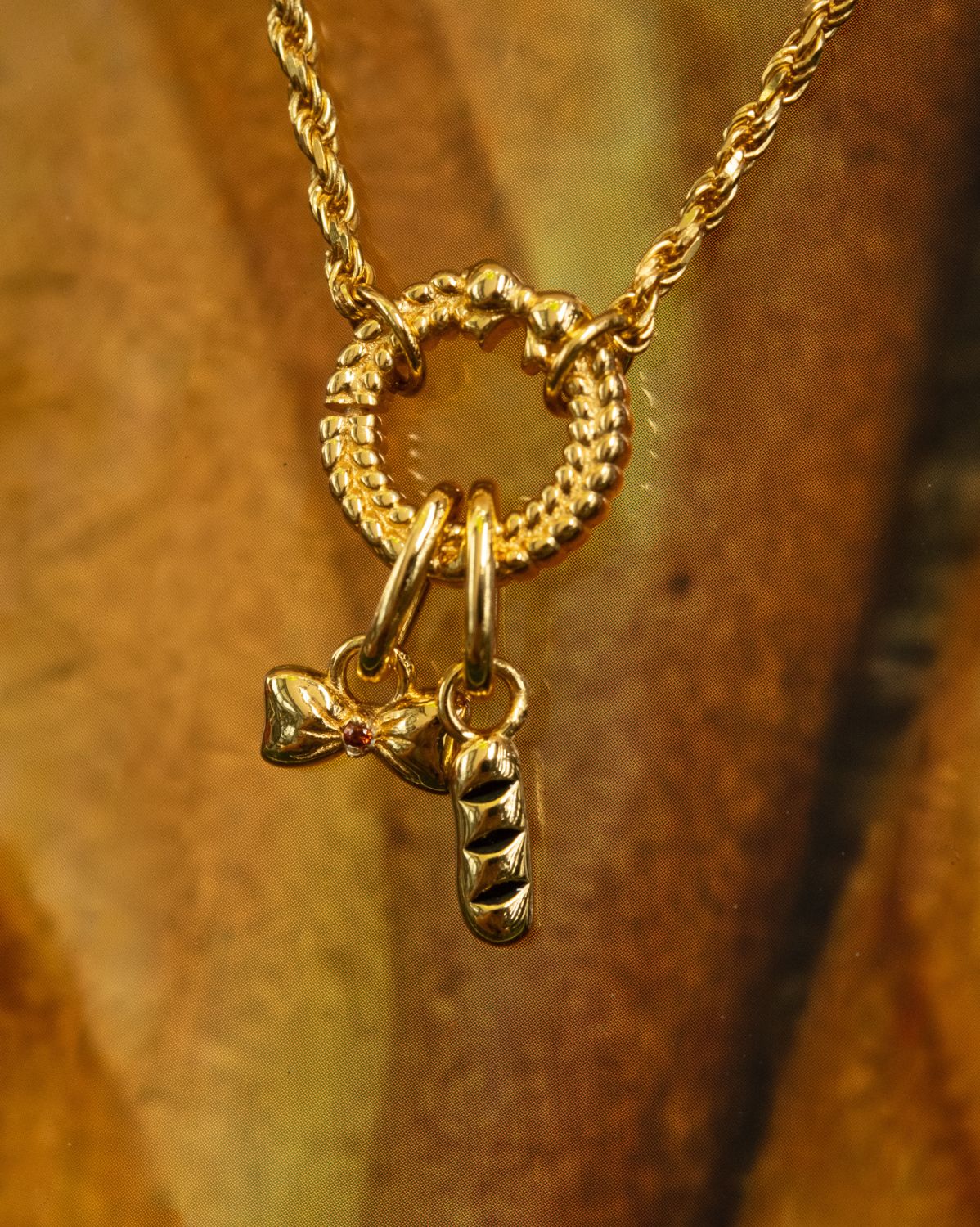 Solid Gold A Witch's Bow Charm