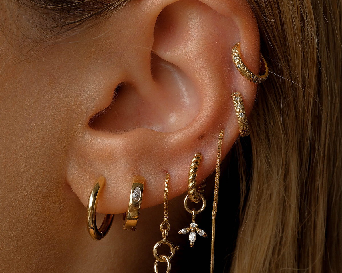 14K Solid Gold Bella Twist Huggie Hoops | S-kin Studio Jewelry | Ethical Piercing Earrings